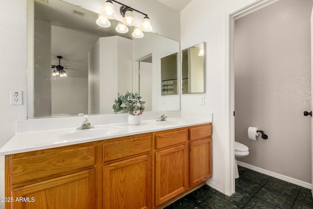 16118 W Morning Glory St, Goodyear, AZ 85338 - bathroom with double vanity and a ceiling fan