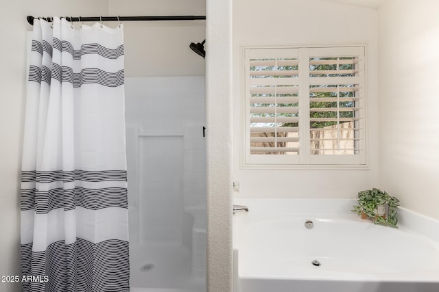 16118 W Morning Glory St, Goodyear, AZ 85338 - full bathroom featuring a garden tub and a shower with shower curtain