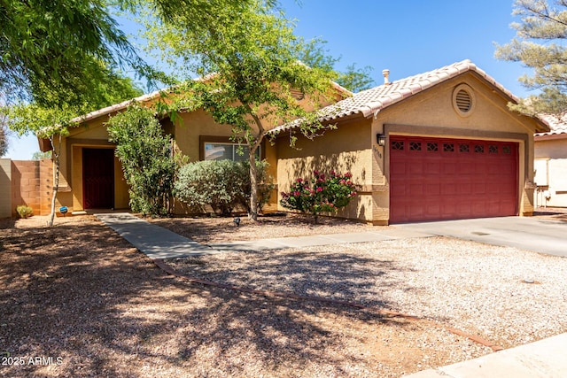 16118 W Morning Glory St, Goodyear, AZ 85338 - single story home with stucco siding, a tile roof, an attached garage, and driveway