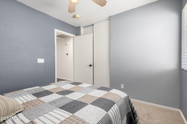 16118 W Morning Glory St, Goodyear, AZ 85338 - carpeted bedroom with a closet and ceiling fan