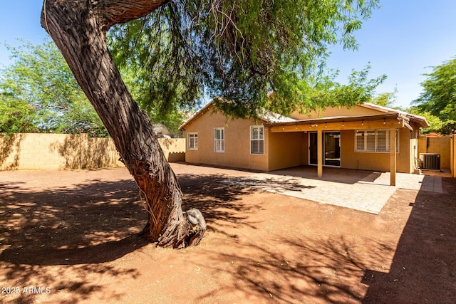 16118 W Morning Glory St, Goodyear, AZ 85338 - back of property with stucco siding and a patio