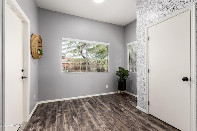 16118 W Morning Glory St, Goodyear, AZ 85338 - unfurnished bedroom featuring wood finished floors and baseboards