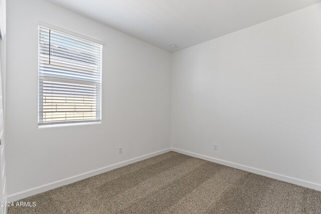 40080 W Venture Rd, Maricopa, AZ 85138 - spare room with carpet