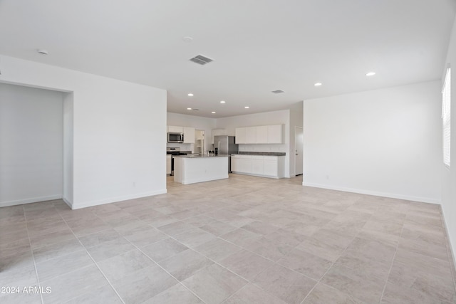 40080 W Venture Rd, Maricopa, AZ 85138 - unfurnished living room featuring light tile patterned flooring