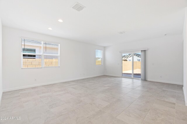 40080 W Venture Rd, Maricopa, AZ 85138 - empty room with light tile patterned floors
