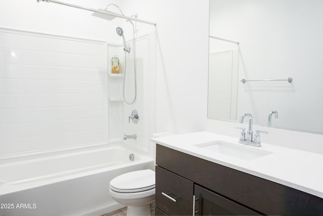 full bathroom featuring vanity, bathtub / shower combination, and toilet