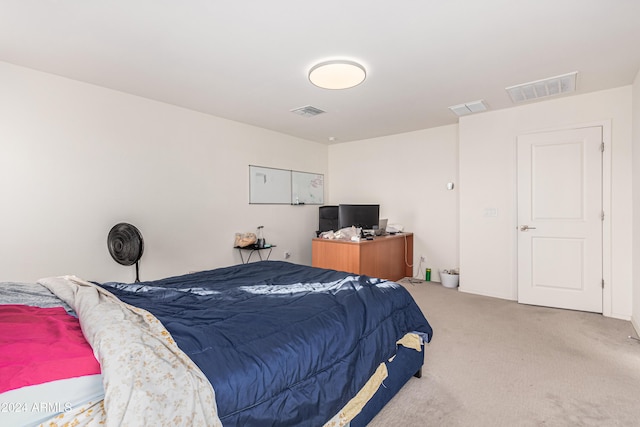 bedroom featuring carpet