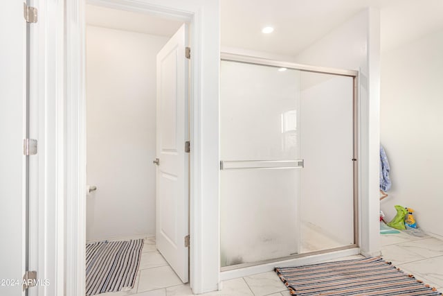 bathroom with walk in shower