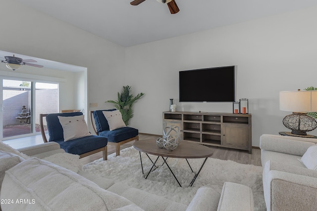 living room with light hardwood / wood-style flooring