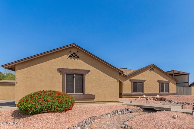 view of front facade featuring stucco siding