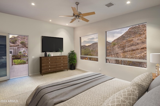 bedroom with access to exterior, carpet, and ceiling fan