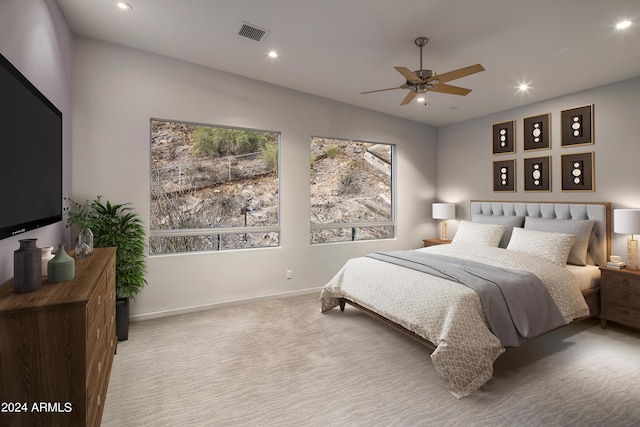 carpeted bedroom featuring ceiling fan