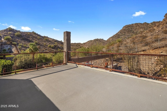 view of patio with a mountain view