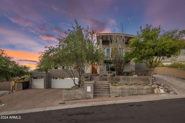 view of front of property featuring a garage