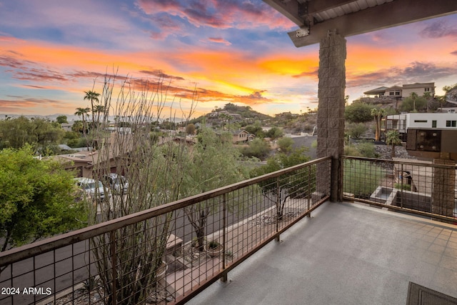 view of balcony at dusk