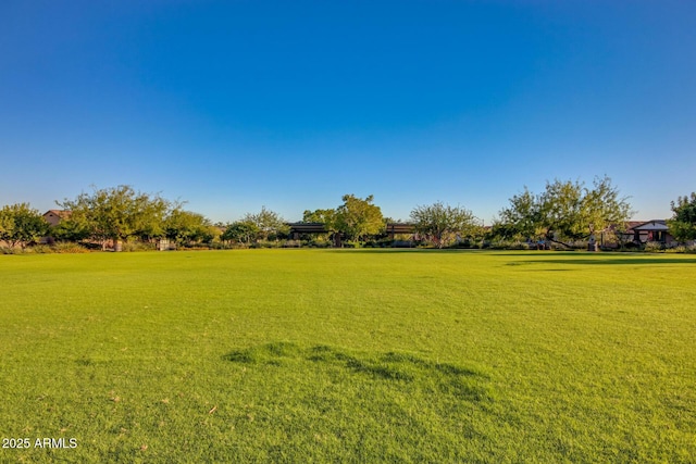 surrounding community with a yard