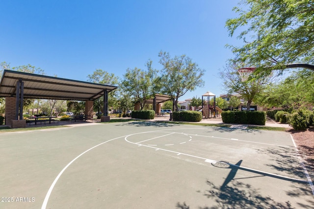 view of sport court with community basketball court and playground community
