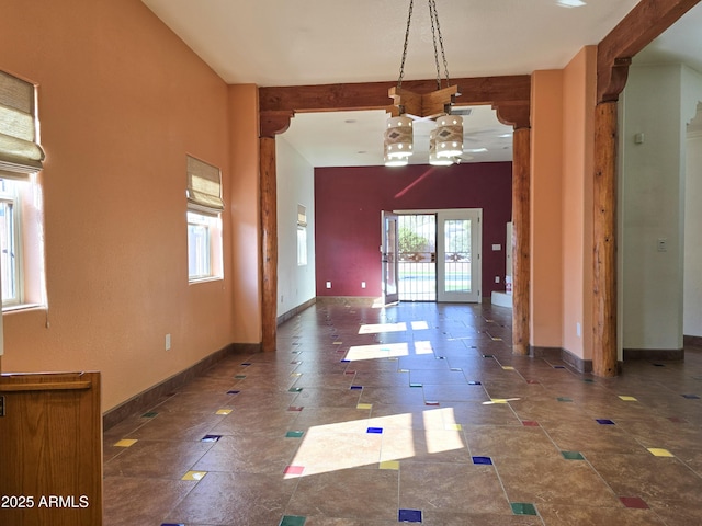 unfurnished dining area with plenty of natural light