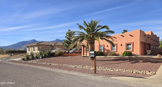 view of front facade with a mountain view