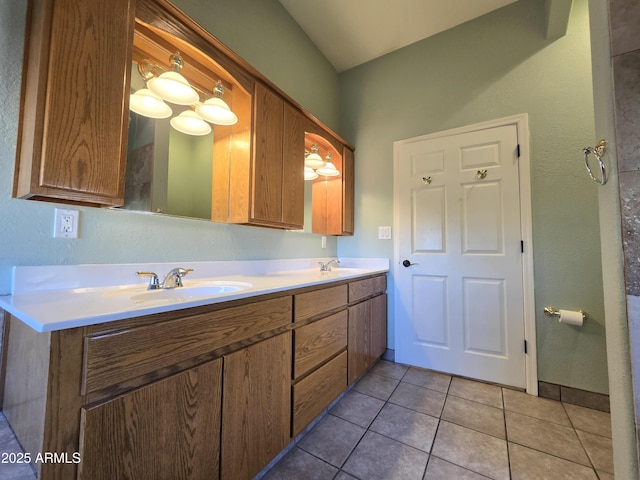 bathroom with vanity and tile patterned flooring