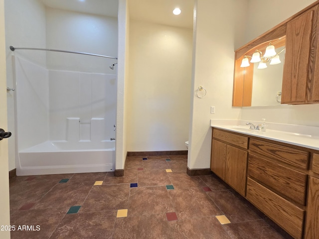 full bathroom featuring toilet, vanity, and shower / washtub combination