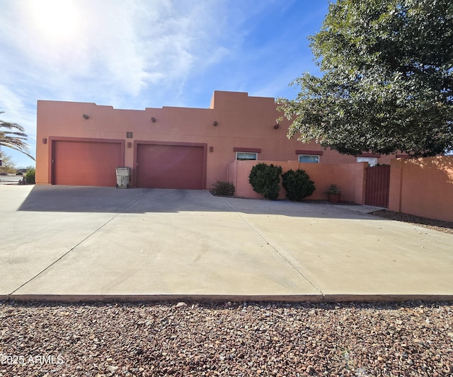 adobe home with a garage