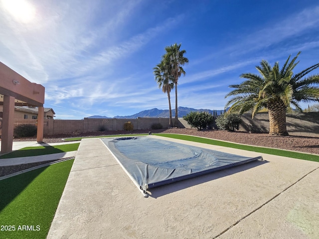 view of pool featuring a mountain view