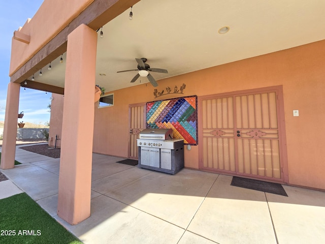 view of patio / terrace featuring ceiling fan and area for grilling