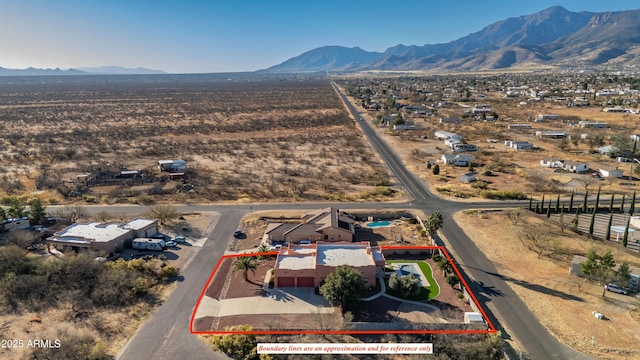 aerial view featuring a mountain view