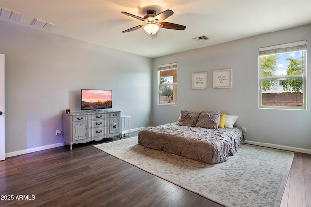 3944 W Paradise Ln, Phoenix, AZ 85053 - bedroom with wood finished floors and ceiling fan