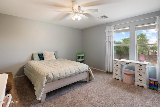 3944 W Paradise Ln, Phoenix, AZ 85053 - bedroom with light carpet and ceiling fan