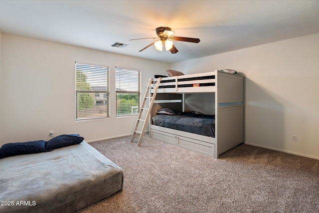 3944 W Paradise Ln, Phoenix, AZ 85053 - carpeted bedroom with baseboards and a ceiling fan