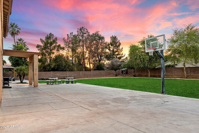 3944 W Paradise Ln, Phoenix, AZ 85053 - patio terrace at dusk with a gazebo, a fenced backyard, and a patio