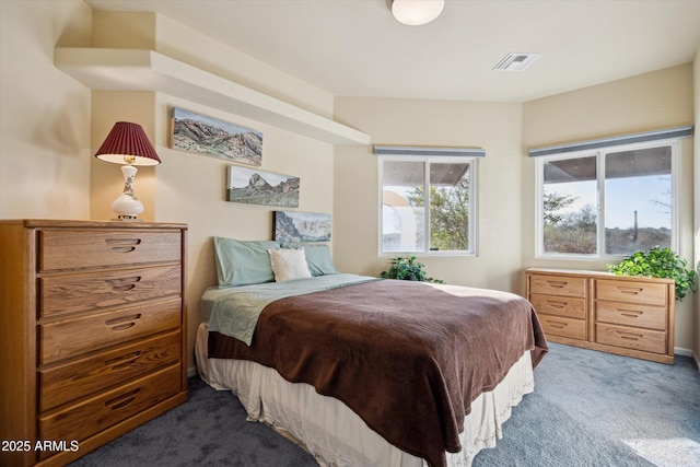 bedroom with carpet flooring and visible vents