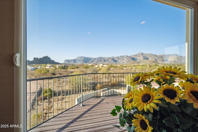 balcony featuring a mountain view