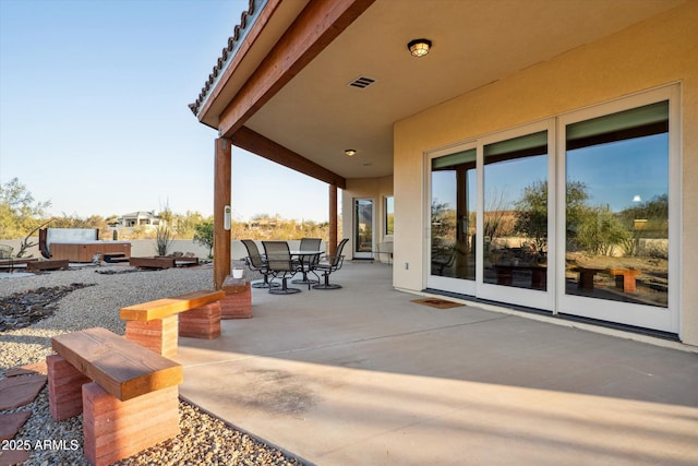 view of patio / terrace with visible vents and outdoor dining space