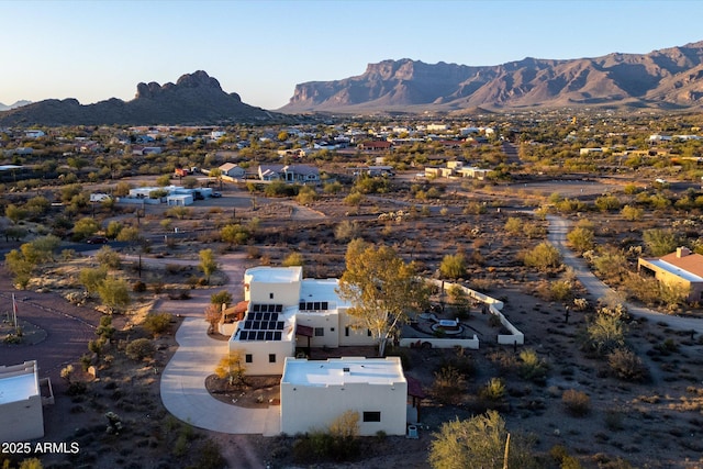 drone / aerial view featuring a mountain view