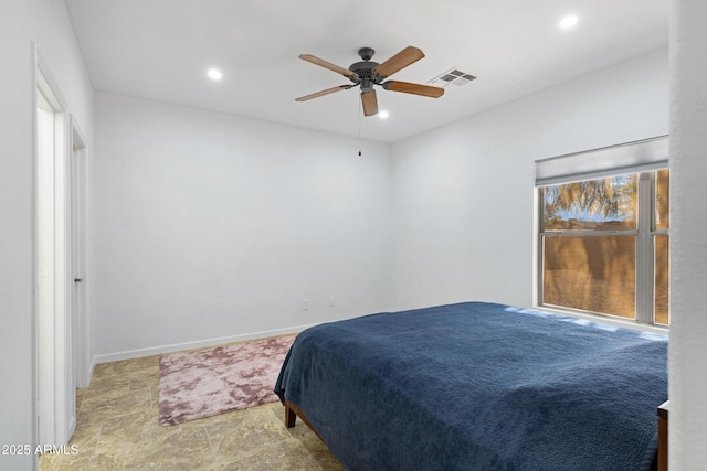 bedroom with recessed lighting, ceiling fan, and baseboards