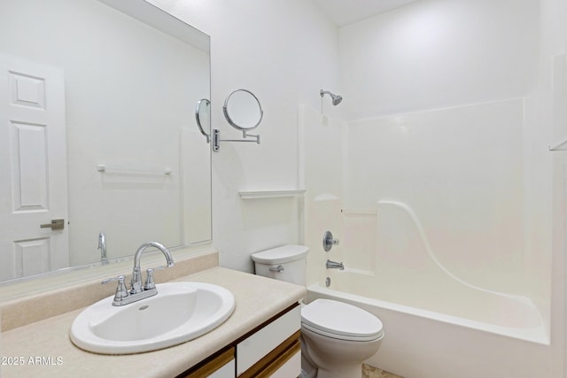 full bath with toilet, vanity, and bathing tub / shower combination