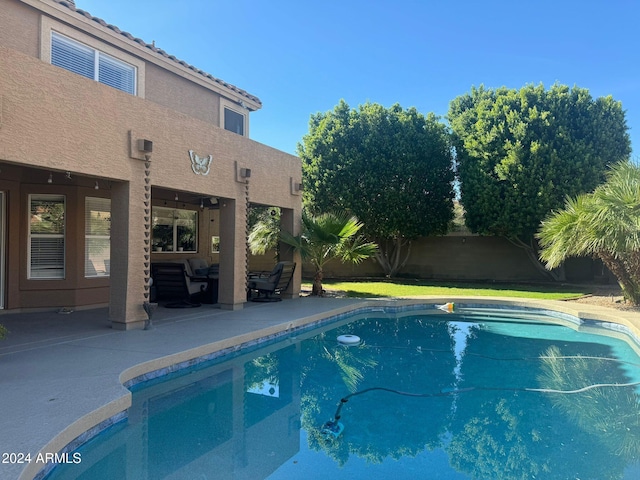 view of pool featuring a patio area