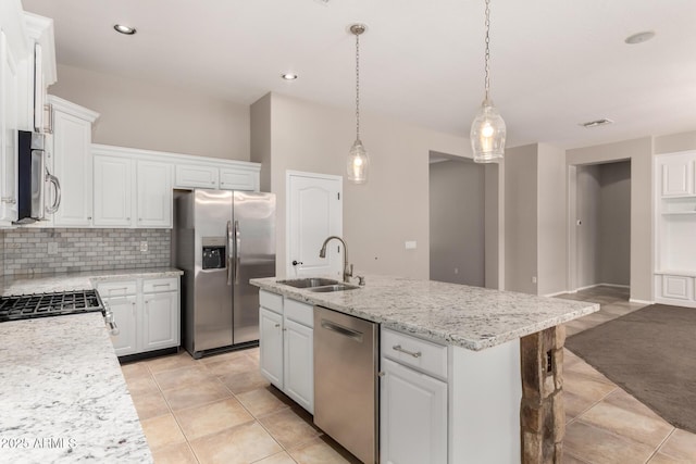 1865 E Locust Pl, Chandler, AZ 85286 - kitchen featuring stainless steel appliances, decorative backsplash, white cabinetry, a center island with sink, and pendant lighting