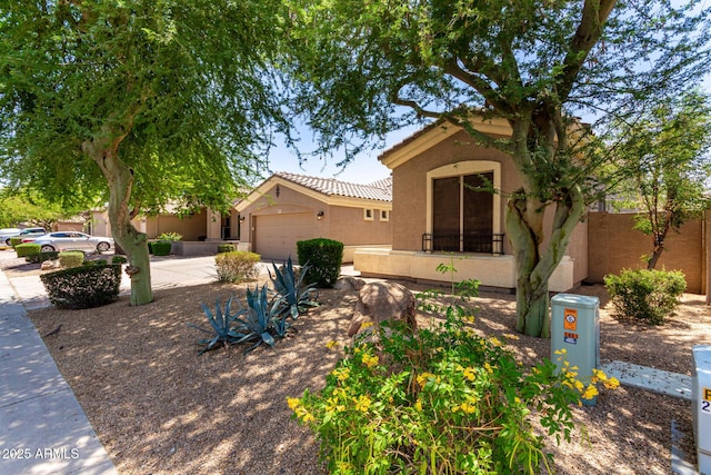 1865 E Locust Pl, Chandler, AZ 85286 - view of front of home featuring stucco siding, an attached garage, driveway, and a tiled roof