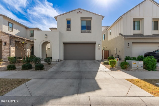 mediterranean / spanish-style house featuring a garage