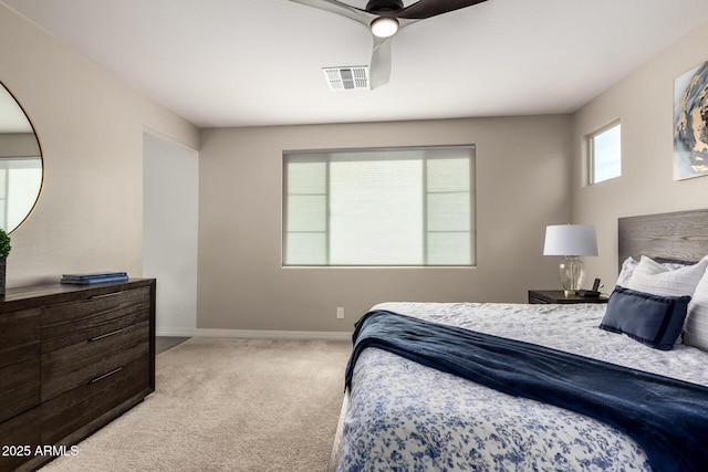 bedroom featuring light carpet