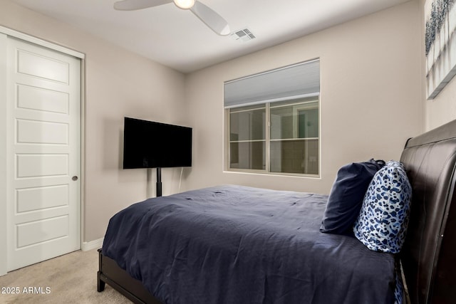 carpeted bedroom featuring ceiling fan