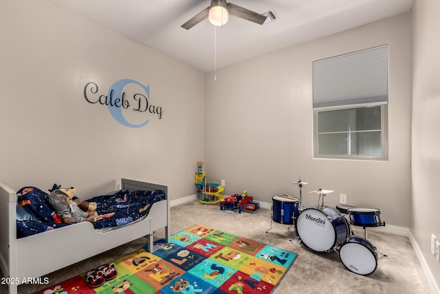 bedroom featuring ceiling fan and carpet floors