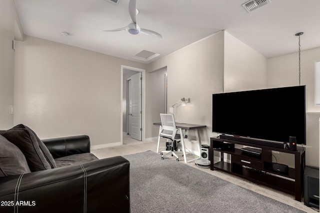 carpeted living room featuring ceiling fan