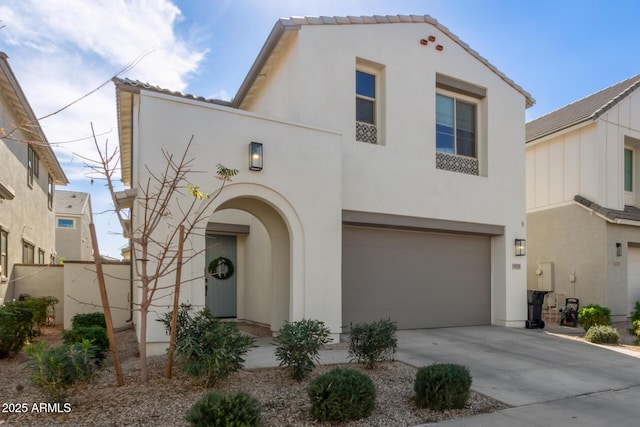 view of front of property featuring a garage