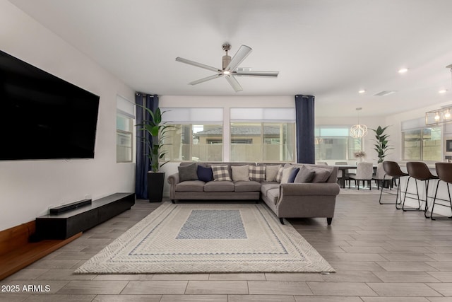 living room featuring ceiling fan