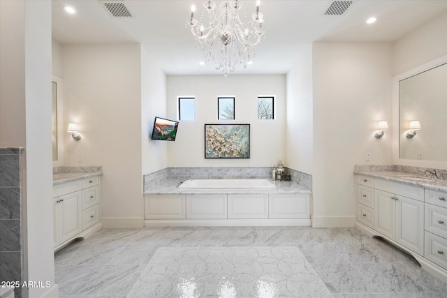 bathroom featuring marble finish floor, two vanities, a sink, and visible vents